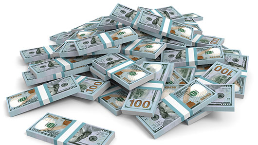 Photo of bricks of cash, us dollar bills